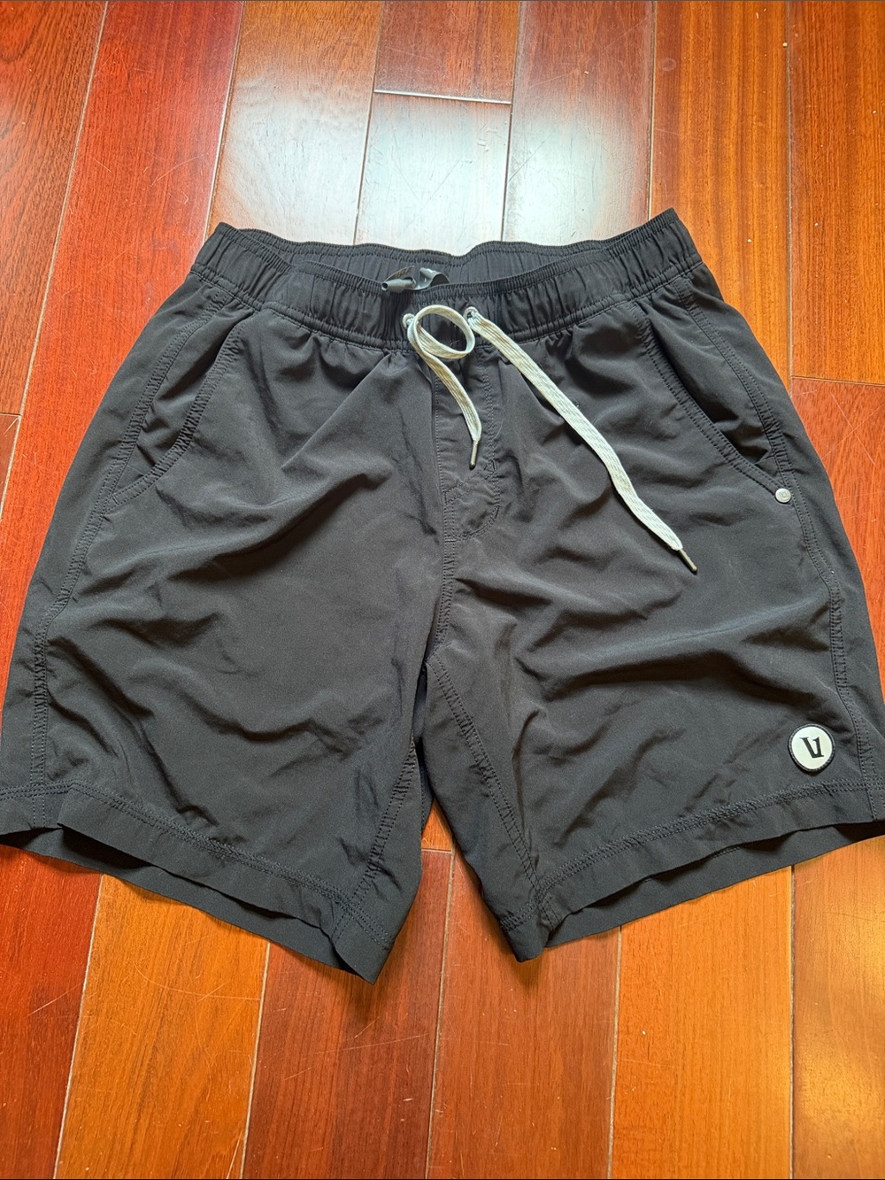 Vuori Men's Athletic Shorts in Black with White Drawstring